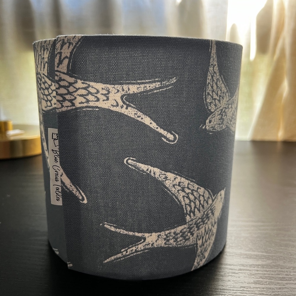 Navy lampshade with white birds. 14" h, 8" diameter